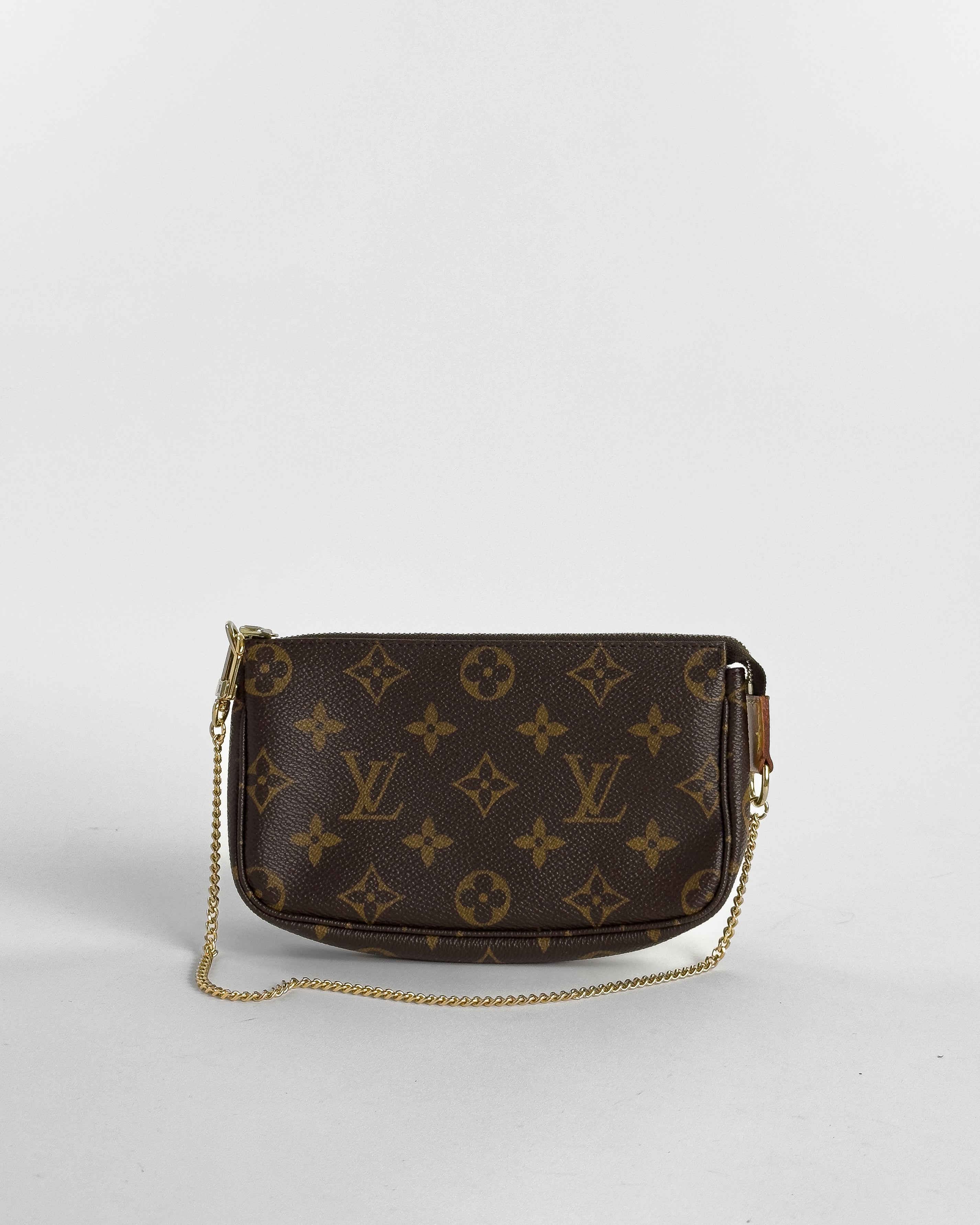 Handla Louis Vuitton Monogram Mini Pochette Accessoires Pouch online | Smidigt och enkelt på nätet - Merchsweden |